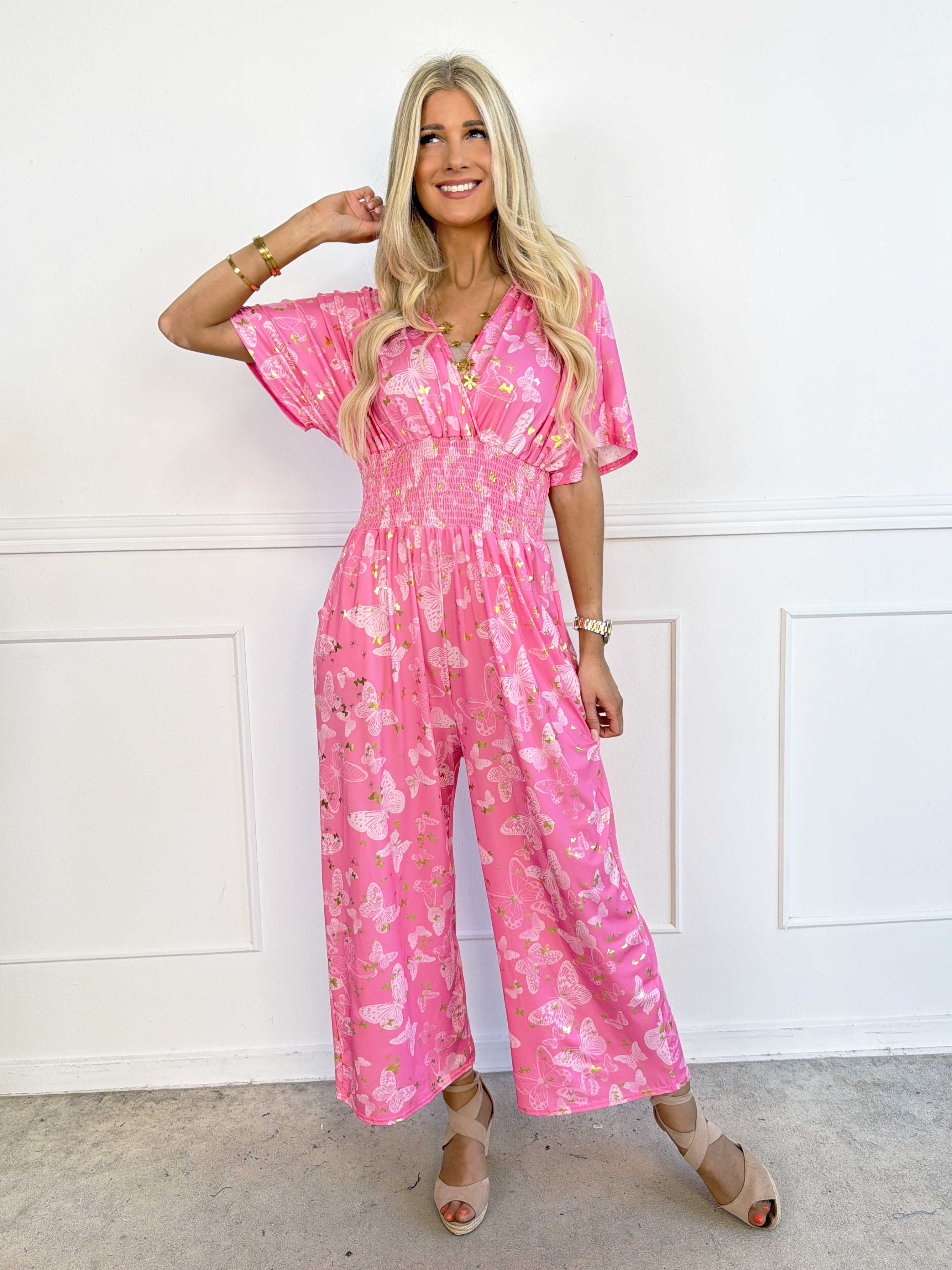 Pams Butterfly Jumpsuit - Elastisk plus size jumpsuit med fjärilsmönster